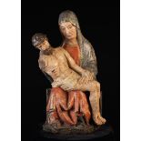 A 15th Century Carved & Polychromed Wood Pietà with hollowed back 22½" (57 cm) high.