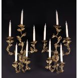 A Pair of Gilt Sheet Metal Five-branch Wall Sconces fashioned as scrolling upswept branches