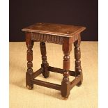 A James I Oak Joint Stool.