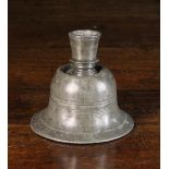 A 17th Century Pewter Ship's Candlestick with large candle socket on a weighted bell-shaped base