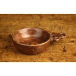 A 19th Century Treen Porringer with pierced lug handle to one side, the bowl 4" (10 cm) in diameter,