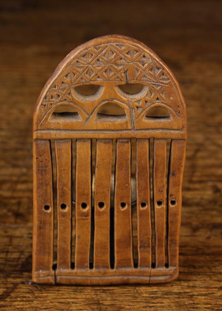 A Small 18th/19th Century Boxwood Loom Comb, decorated with chip carving, 3¾" x 2¼" (9.5 cm x 5.