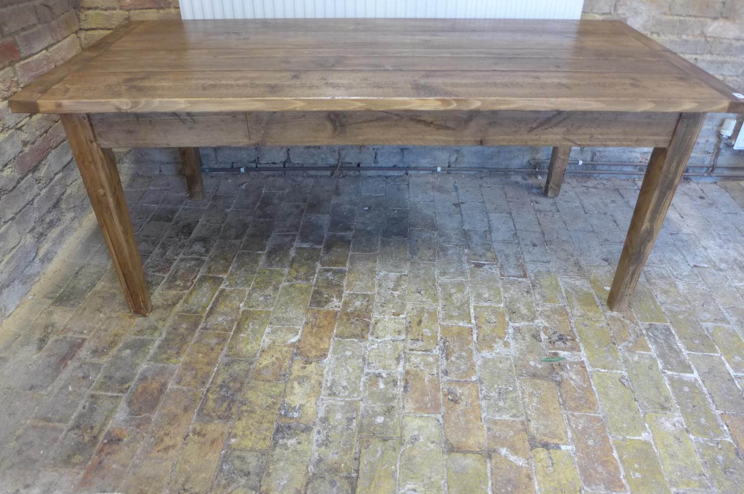A rustic pine kitchen table, 188cm long, 85cm wide