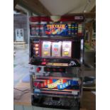 A Japanese tri-colour, red, white and blue, electric arcade slot machine, in good working order,