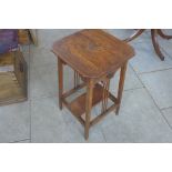 An early 20th century Arts and Crafts oak occasional table with octagonal top, top 40x40cm -