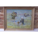 Oil on canvas, children playing in the sea, signed indistinctly, in a gilt over painted frame,