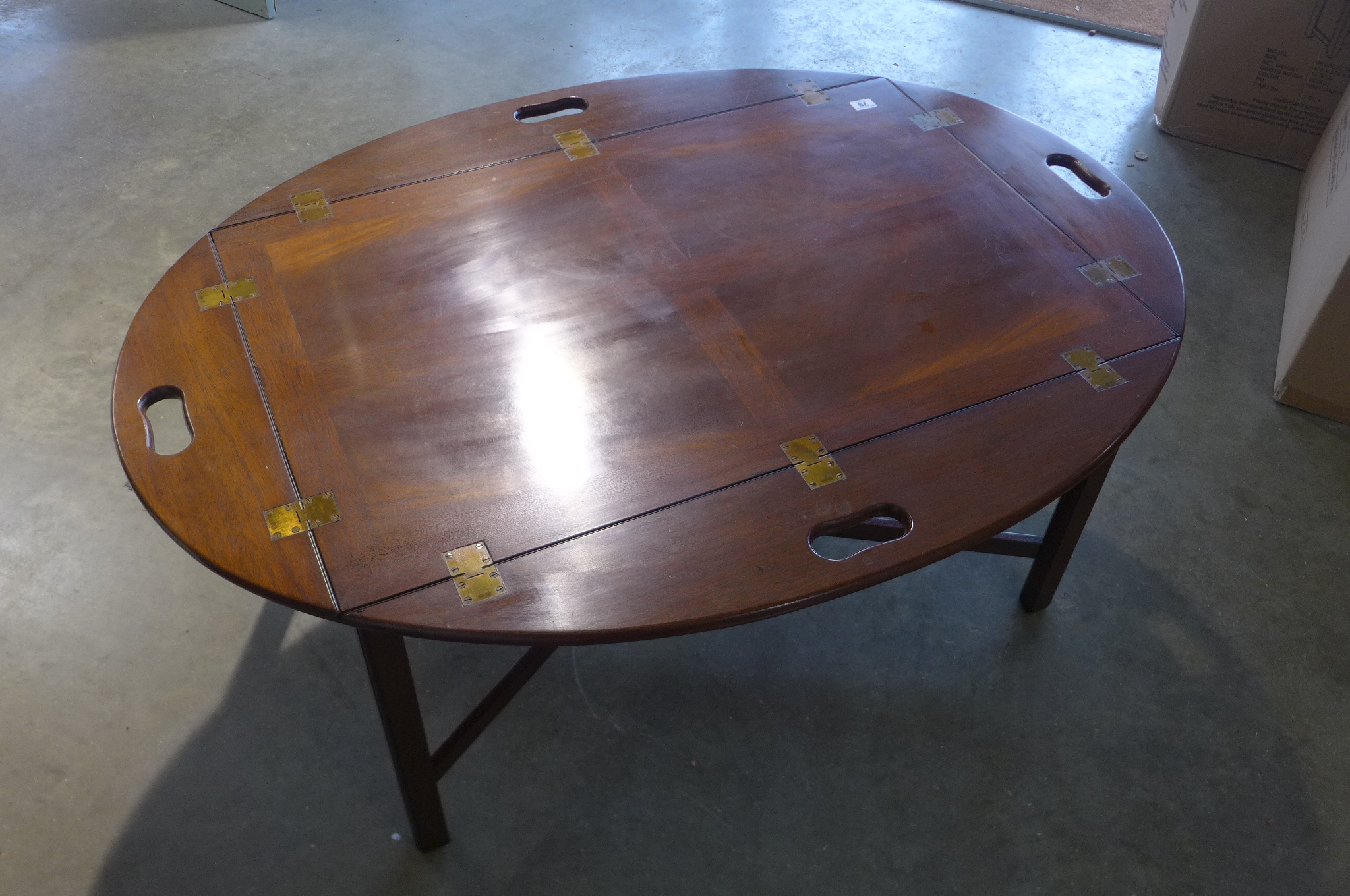 A mahogany butlers tray on stand on the form of a coffee table, 63cm H x 93cm x 62cm closed - Image 2 of 3