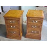 A pair of burr oak bedside chests, each with a brushing slide above three drawers, made by a local