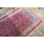 A hand knotted woollen Hamadan rug - 348x136cm