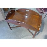 A mahogany butlers tray on stand on the form of a coffee table, 63cm H x 93cm x 62cm closed