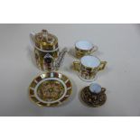 Four pieces of miniature Royal Crown Derby Imari ware, and an early coffee can and saucer, all good