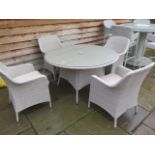 A Bramblecrest Tetbury Round Table - 110cm W and four chairs, ex-display