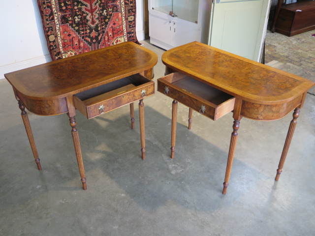 A pair of walnut D shaped side tables with a single drawer on turned reeded legs, made by a local - Image 2 of 3