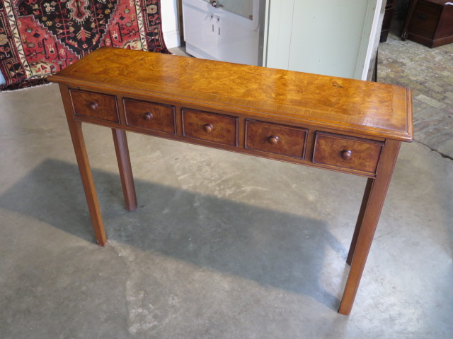 A walnut hall table with five small drawers, 77cm H x 108cm x 30cm - made by a local craftsman to