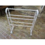 A white painted Victorian towel rail