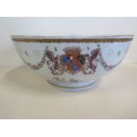 A 19th century Armorial porcelain bowl decorated with flowers and swags, 13cm tall, 29cm diameter,