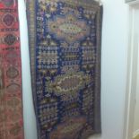 A hand knotted woollen Baluchi rug - 166cm x 96cm