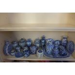 A collection of assorted blue and white china, mainly modern Chinese pieces, twenty-four in total