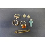 Three 9ct yellow gold rings, a 9ct pin, two 9ct pendants - weight approx 15.9 grams, and a jade