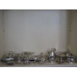 Assorted plated items, including cruet and dishes