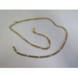 A 14ct yellow gold chain marked 585 7.11 - 57cm long, approx 21.5 grams, generally good, clasp