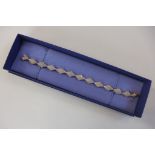 A hallmarked 9ct yellow gold diamond bracelet, 19cm long with approx 3.0ct of diamonds, approx 12.