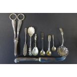 A pair of silver grape shears and assorted silver flatware, weighable silver approx 5.1 troy oz