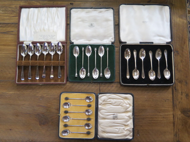four boxed sets of silver spoons, total weight approx 8.8 troy oz