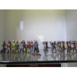 A collection of assorted Britains lead figures including Native American Indians and Zulus