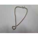 A silver Dower and Hall necklace consisting of multi bead links and large engraved heart pendant -