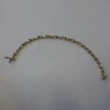A 9ct yellow gold and diamond bracelet, approx 10 grams, 18cm long - in generally good condition