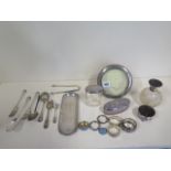 Assorted silver ware, including flatware, bottles, a tidy and a photo frame, total weighable