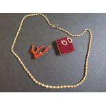 A collection of coral and pearl jewellery, including necklace - 73cm - brooch and earrings with