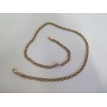 A hallmarked 9ct yellow gold chain, 41cm long, approx 9.5 grams, clasp working, some wear consistent