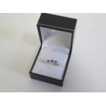 A hallmarked 9ct white gold blue and pink sapphire five stone ring, size L, approx 2.7 grams, in