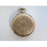 A 14ct gold top wind pocket watch with base metal back plate, 30mm wide, approx 27 grams, running