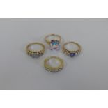 Four hallmarked 9ct gold dress rings, approx 12.5 grams, all good or unused condition