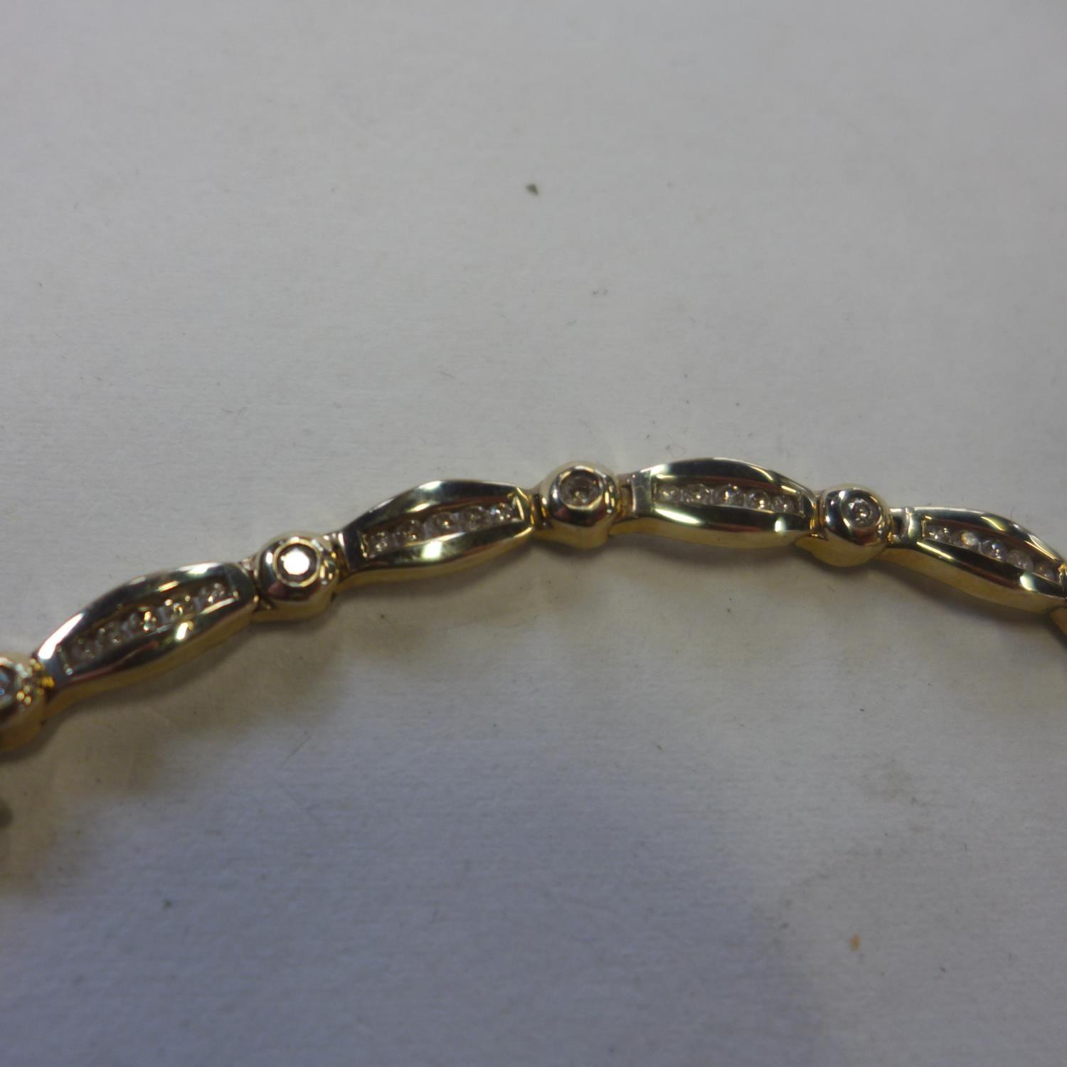 A 9ct yellow gold and diamond bracelet, approx 10 grams, 18cm long - in generally good condition - Image 2 of 3