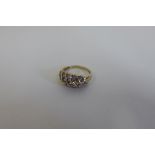 A hallmarked 9ct tanzanite set ring, size O, approx 3.3 grams, generally good