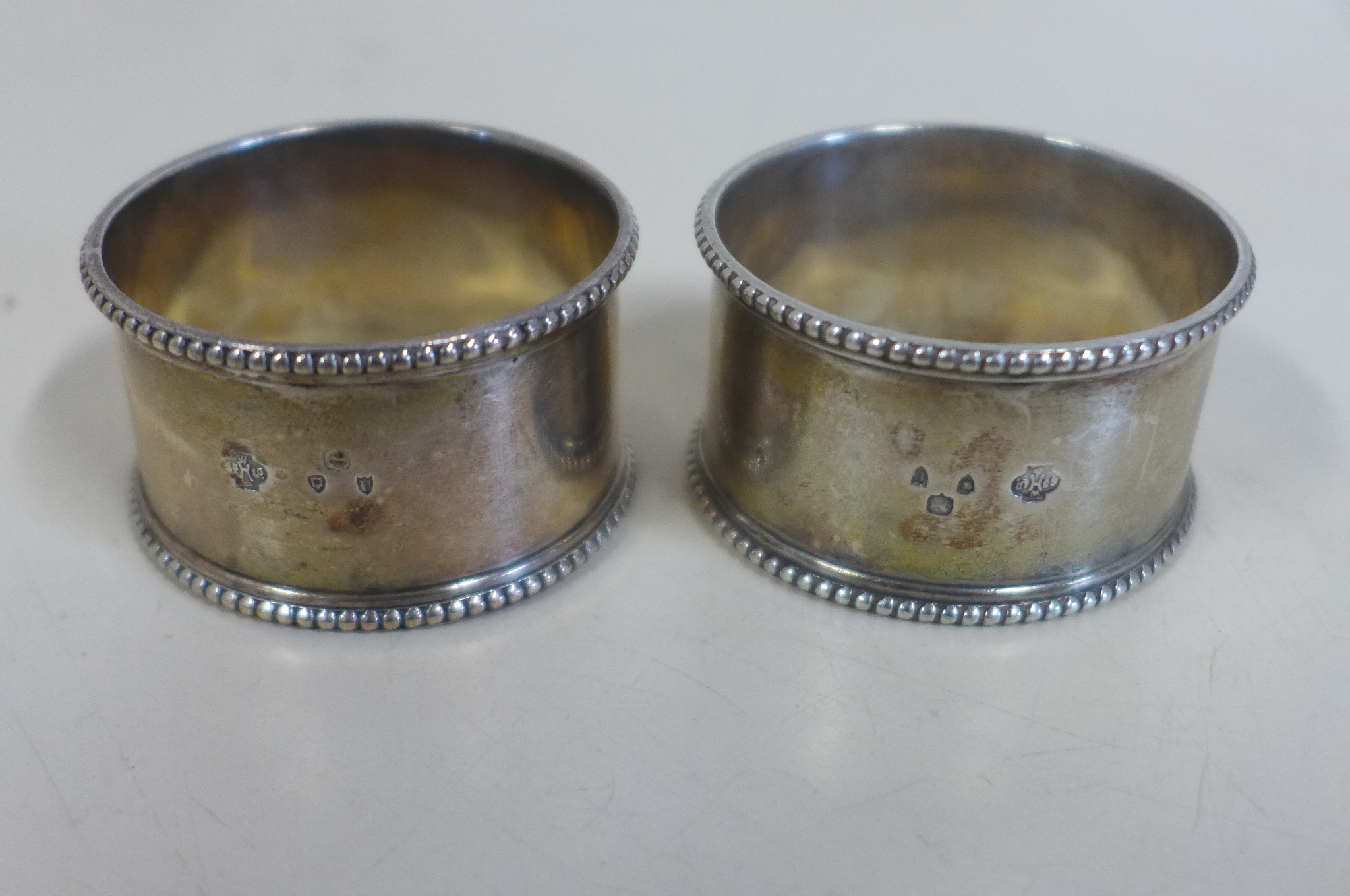 Six silver napkin rings, and a pair of napkin rings, approx 3.4 troy oz - Image 2 of 3