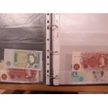 A folder of world bank notes