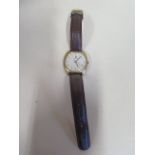 A vintage manual wind gents Zenith wristwatch, No 20-1290-360 - case 35mm wide, in running order,