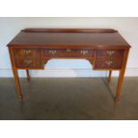 A 20th century yew wood side/dressing table, 80cm tall x 128cm x 53cm - in good polished condition