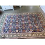 A hand knotted woollen Ardabil rug - 307cm x 198cm