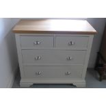 A Furniture Village light grey painted four drawer chest, in good condition