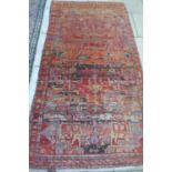 A hand knotted woollen Hamadan rug - 267x146cm