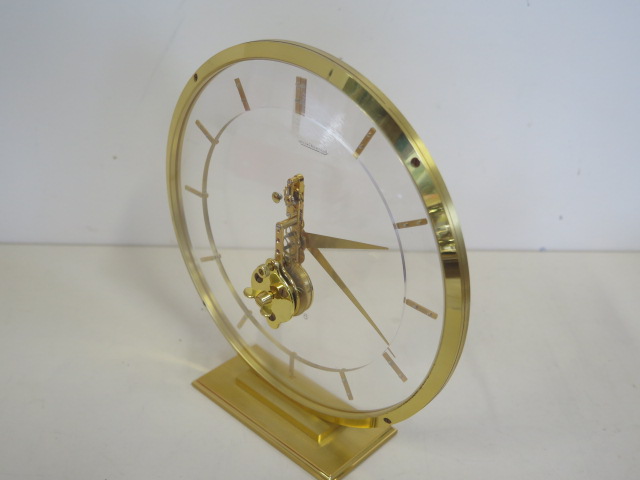 A Jaeger-leCoultre mystery clock with gilt case and baton markers, 19cm tall with original box, - Image 3 of 3