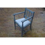 A refurbished open armchair, painted in Farrow and Ball paint, reupholstered matching previous lot