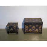 Two chinoiserie black transfer decorated boxes, largest 43x59x38cm