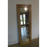 A long pine framed rustic style mirror fitted with Victorian plate mirror, size 181x62cm